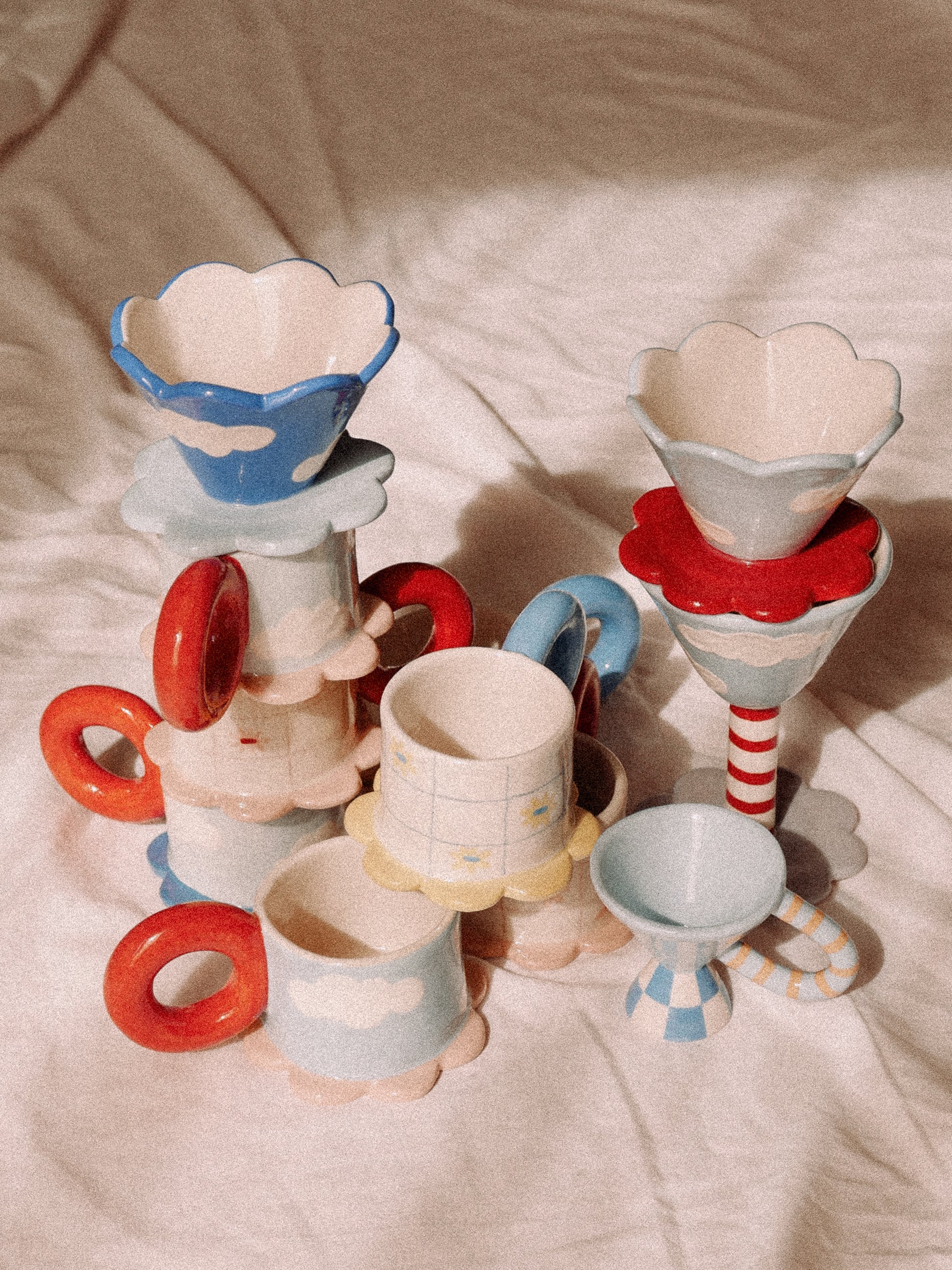 a group of unique ceramics handmade mugs and drippers